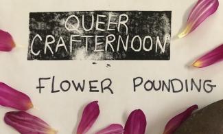 A poster has text from stamps and sharpie writing reading "Queer Crafternoon: Flower pounding. Saturday July 25 1:30-3 PM Oaklands Park. Funded by the City of Victoria." On top of the poster are pink flower petals and the head of a hammer. 